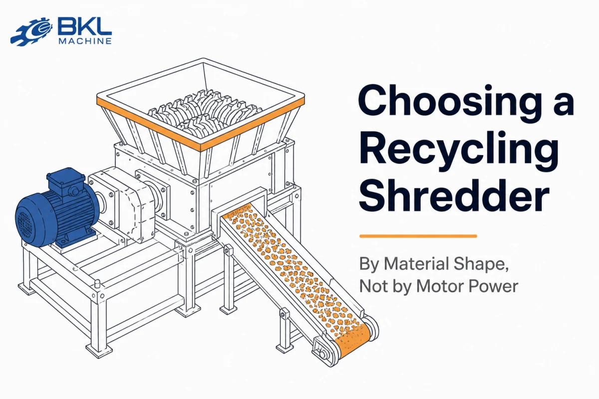 Diagram of a twin-shaft plastic shredder with hopper, rotors and discharge conveyor
