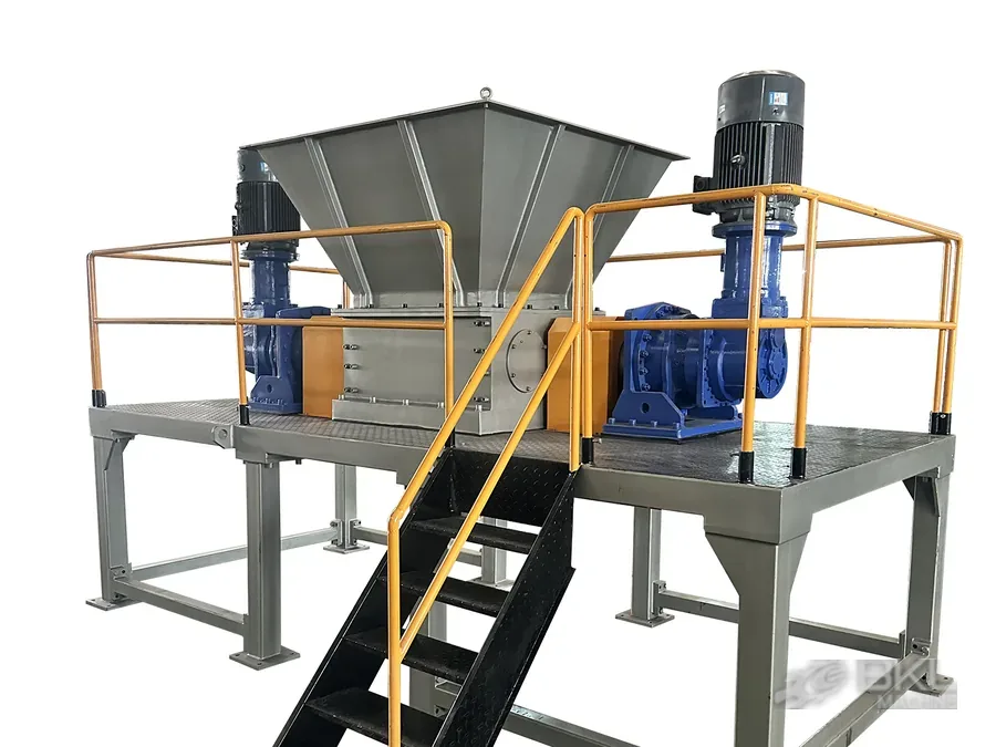 Twin-shaft shredder rotor and knives before assembly