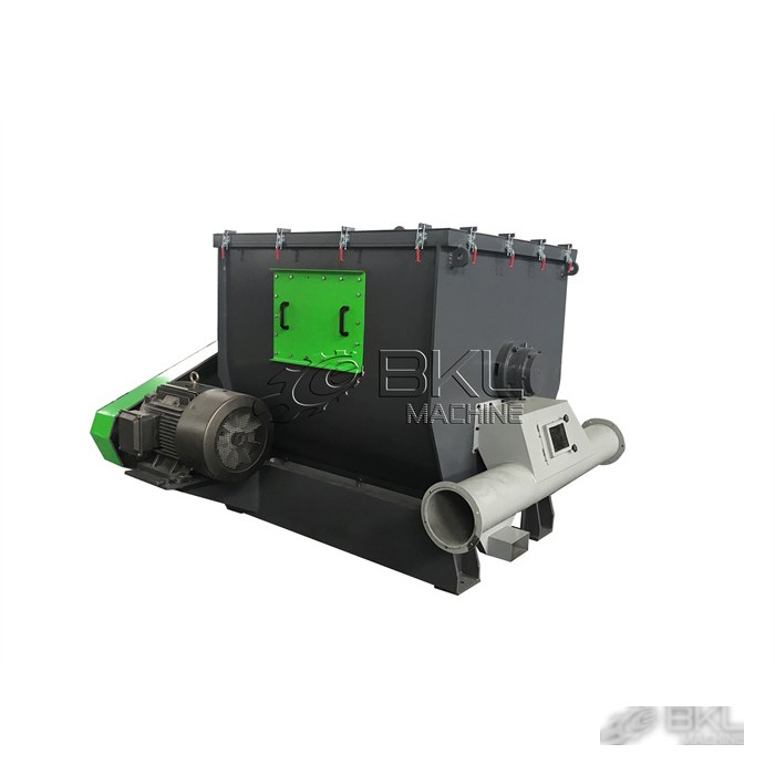 Centrifugal dryer rear view with long discharge pipe, top clamp latches and green access cover