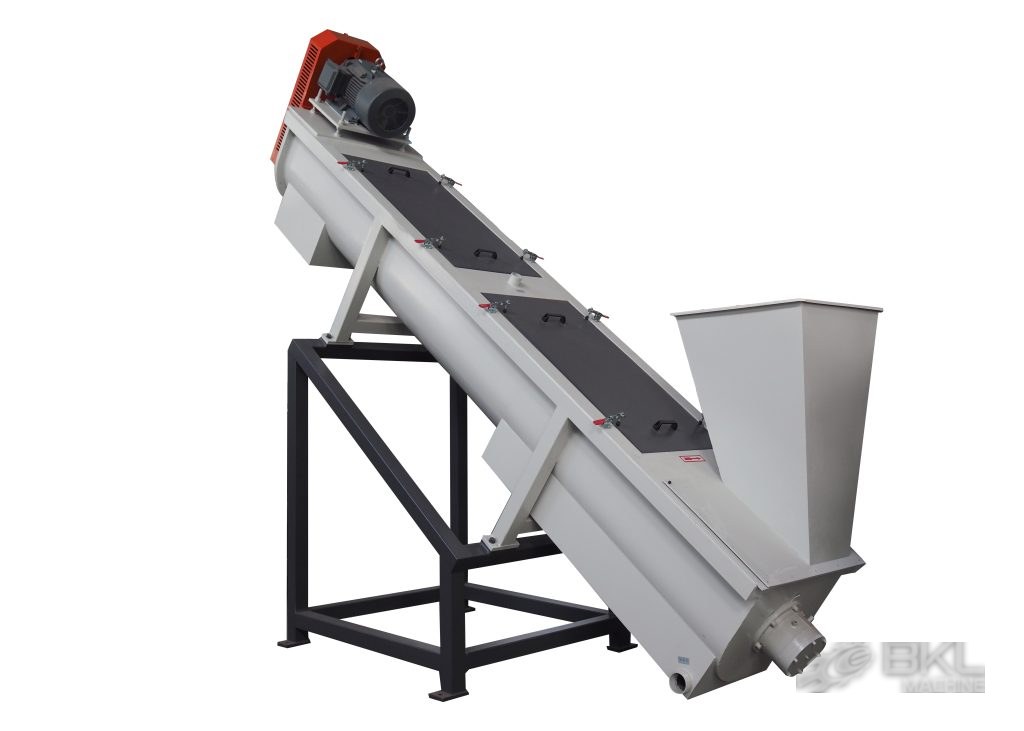 Steeply inclined friction washer tube with a row of clamped access covers and top drive motor