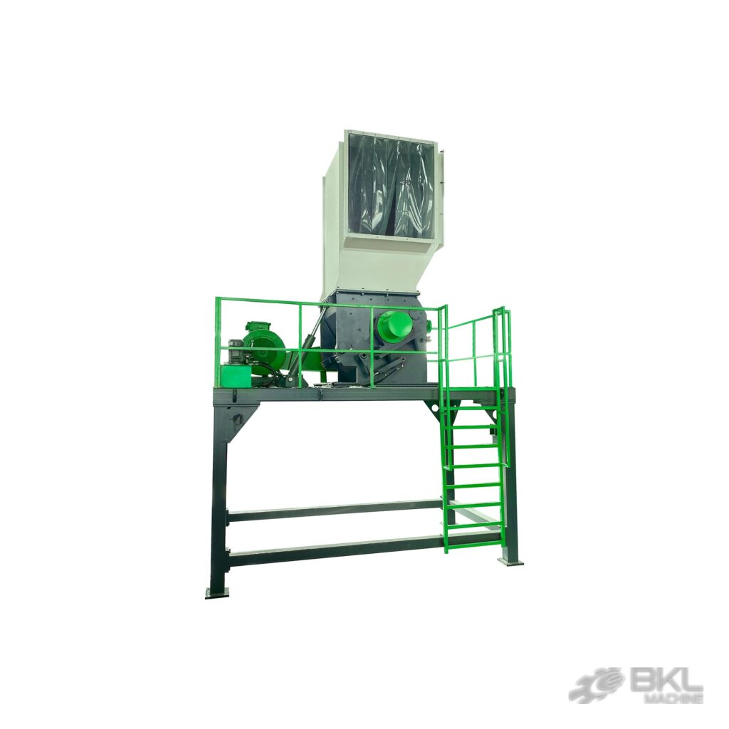 Heavy-duty plastic crusher on an elevated steel platform with tall feed hopper and side-mounted drive motor