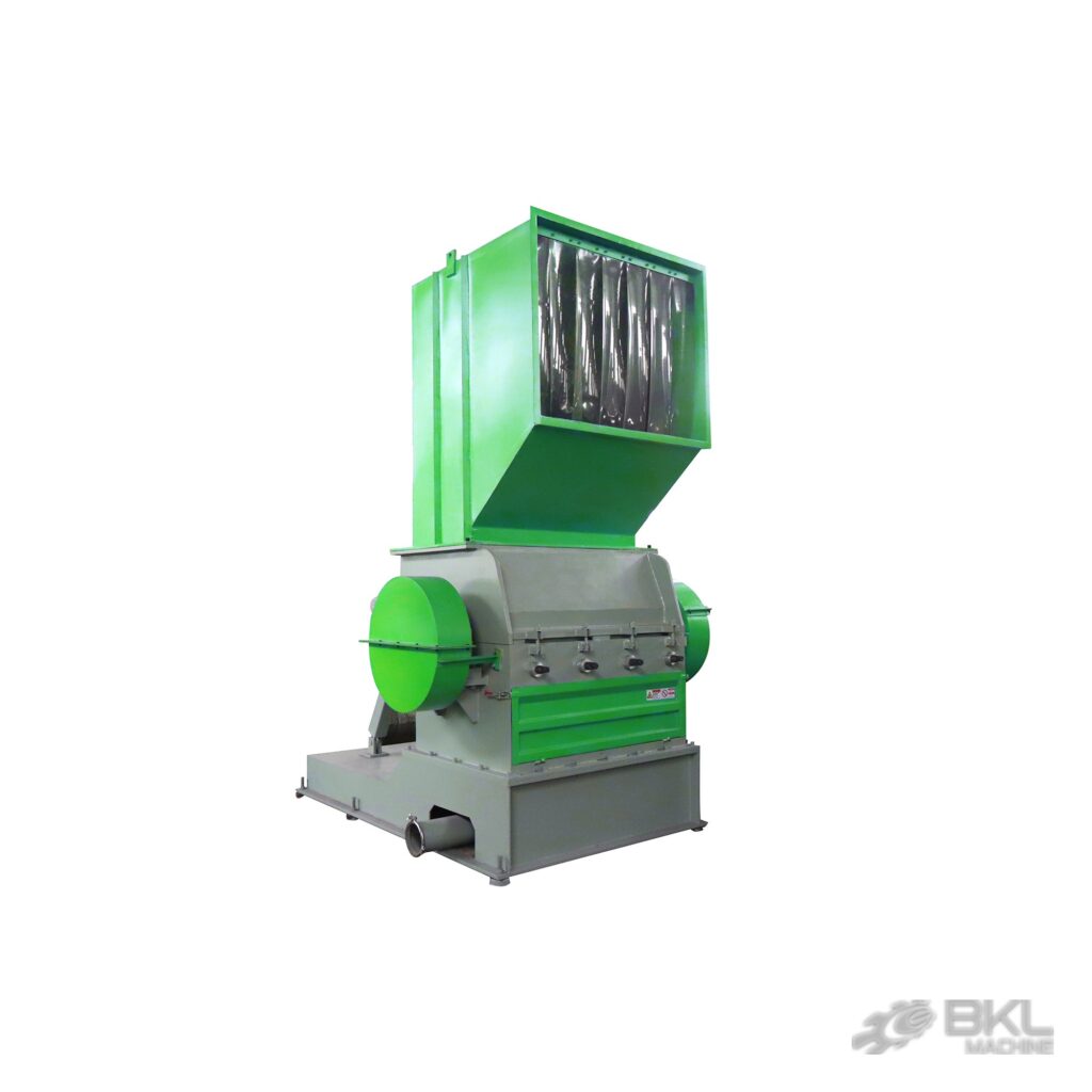 Plastic crusher with green feed hopper, rubber splash curtain and grey crushing chamber housing