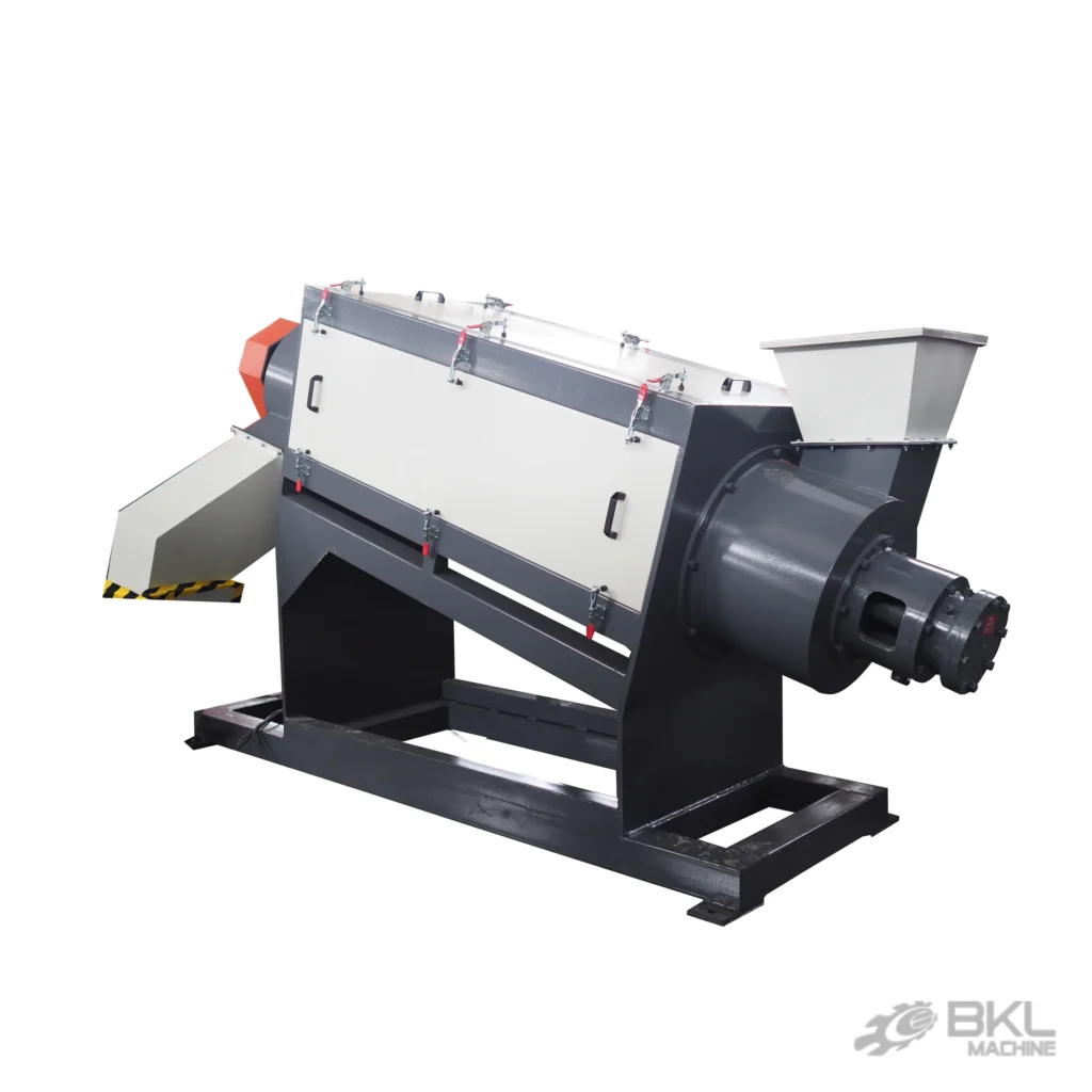 Inclined friction washer with bolted bearing housing, stainless feed hopper and hazard-marked outlet chute