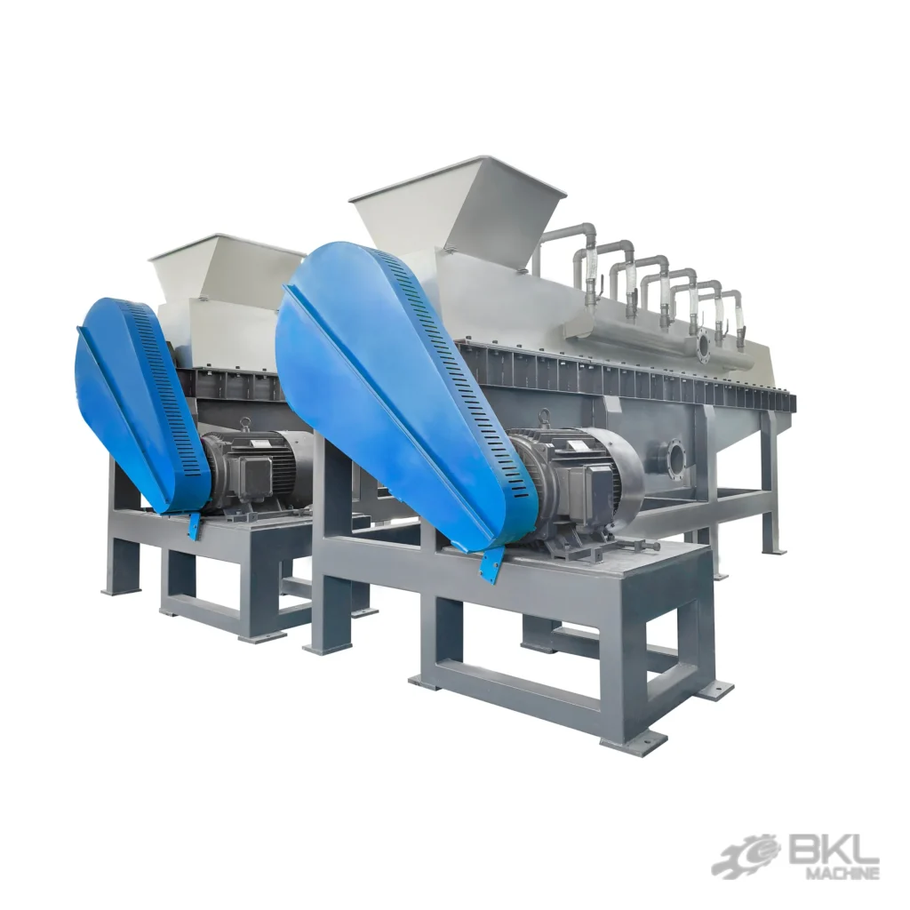 Two strong friction washers in parallel with blue belt guards and a row of spray water inlets