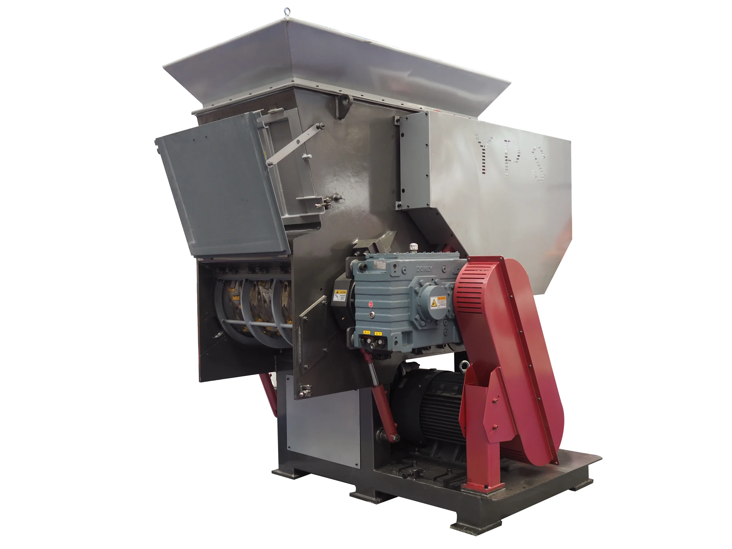 Single-shaft shredder cut out on a white background, showing the feed hopper, hydraulic pusher housing and belt-guarded drive