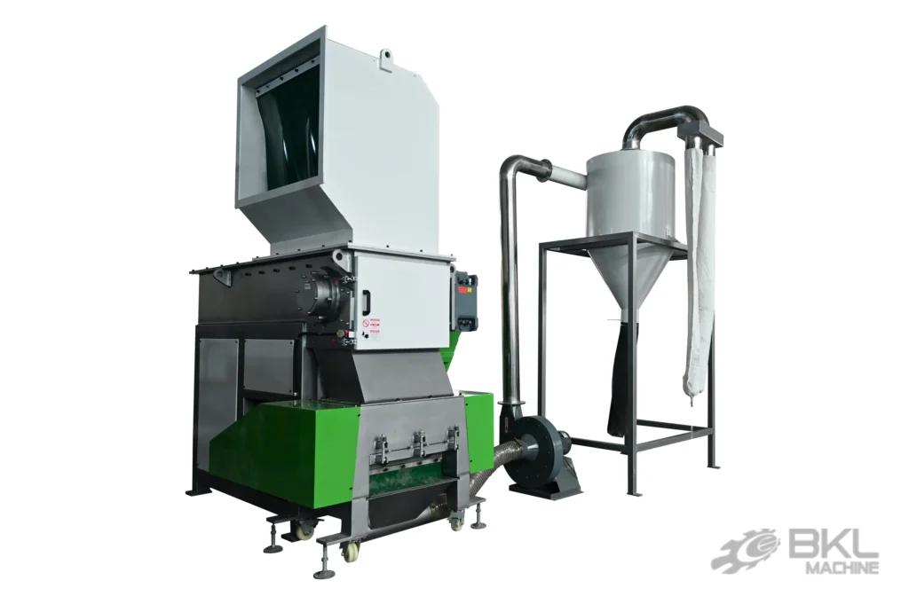 Shredder and crusher combined unit in green and white with blower, cyclone silo and fabric collection bag