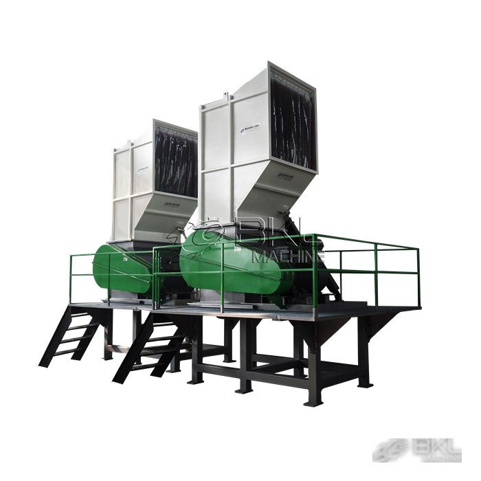 Three HVC heavy-duty plastic crushers installed side by side on a shared steel platform