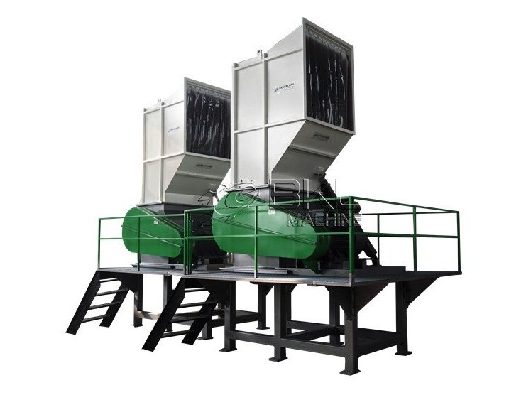 Three HVC heavy-duty plastic crushers installed side by side on a shared steel platform