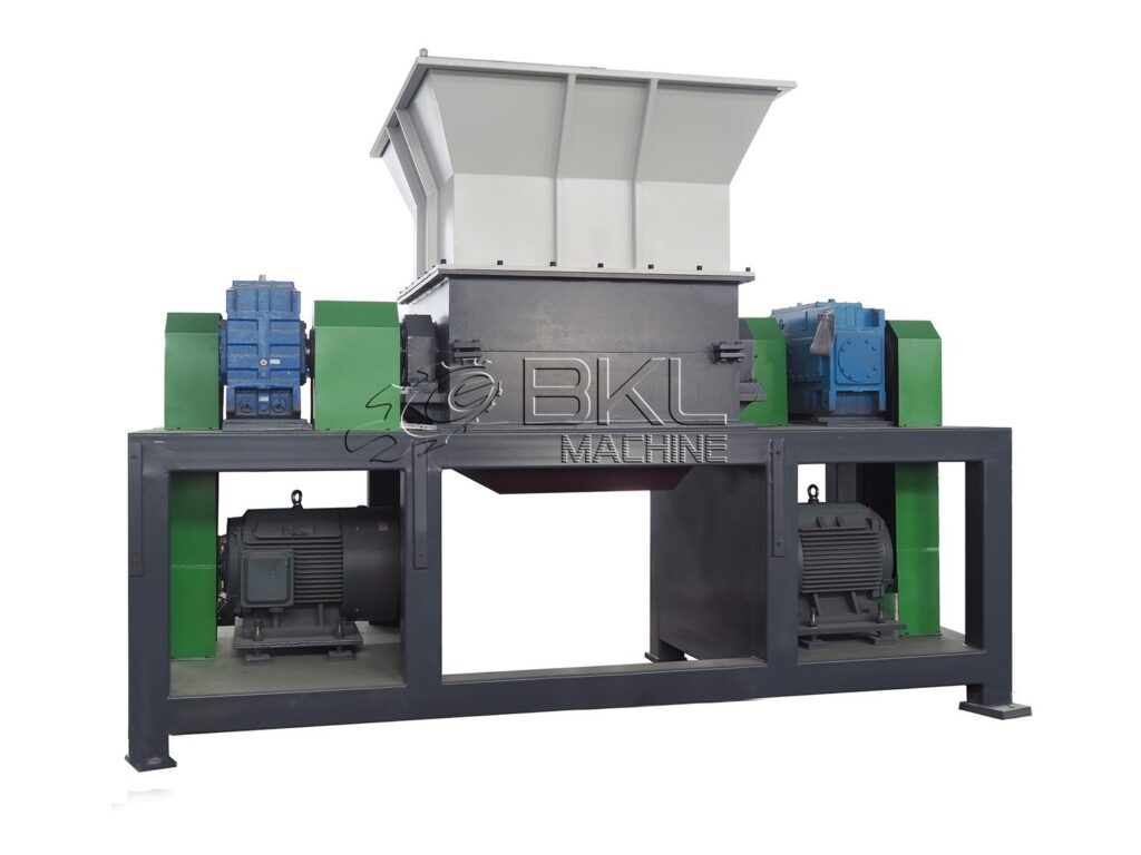 BKL-MACHINE DS twin-shaft shredder used for coarse tyre shredding, with two independent drive motors and a wide feed hopper