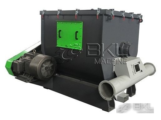 Centrifugal dryer rear view with long discharge pipe, top clamp latches and green access cover