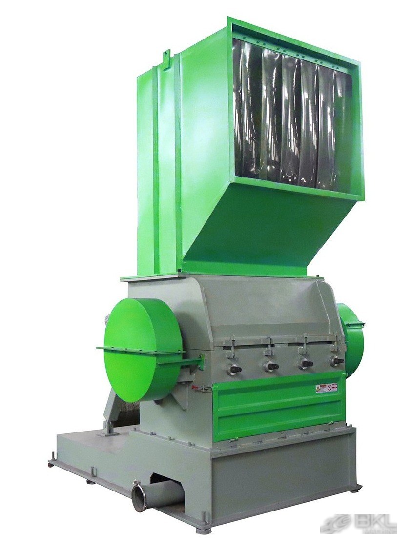 Plastic crusher with green feed hopper, rubber splash curtain and grey crushing chamber housing